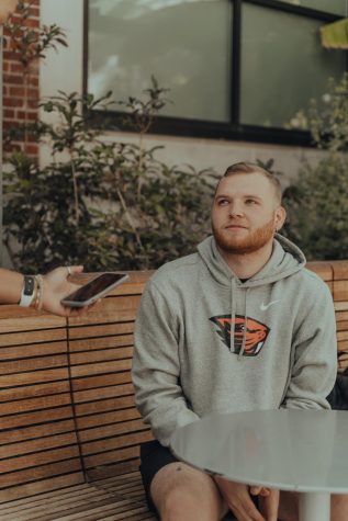 Fourth-year OSU student Noah Hyatt, pictured outside the Student Experience Center.