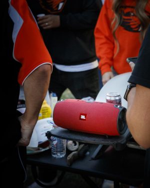 JBL speaker in the middle of tailgating party