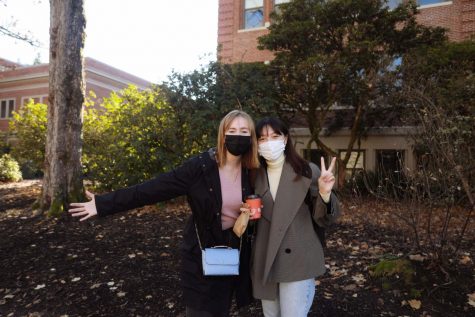 Maddie Ashcraft and friend Hana Ichimura stand outside of Langton Hall on the OSU Corvallis, Ore. campus.