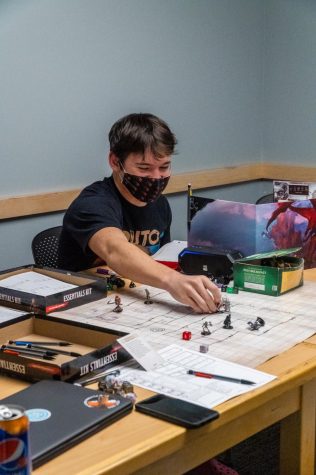 college student playing dungeons and dragons