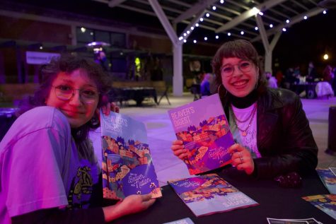 Natalia Catena (left) and Brooke Donaty (right) hold up their magazines at the Beaver's Digest Best Of Beaver Nation 2022 launch party.
