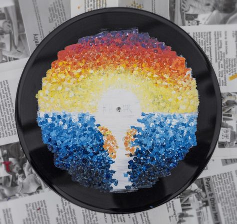 Record painted by Amelia Noall features an abstract sunset.