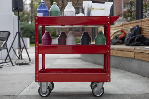 A cart of paint in the plaza.