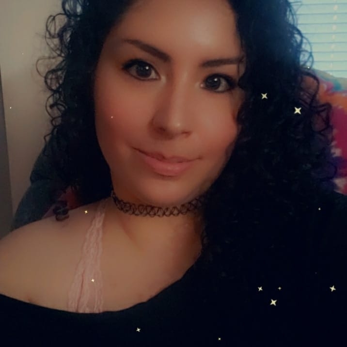 Selfie of Teresita Guzman Nader with a sparkly filter.
