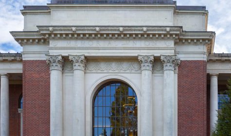 A close-up shot of the front entrance of the memorial union. The door is arched and reads "Memorial Union" above it.