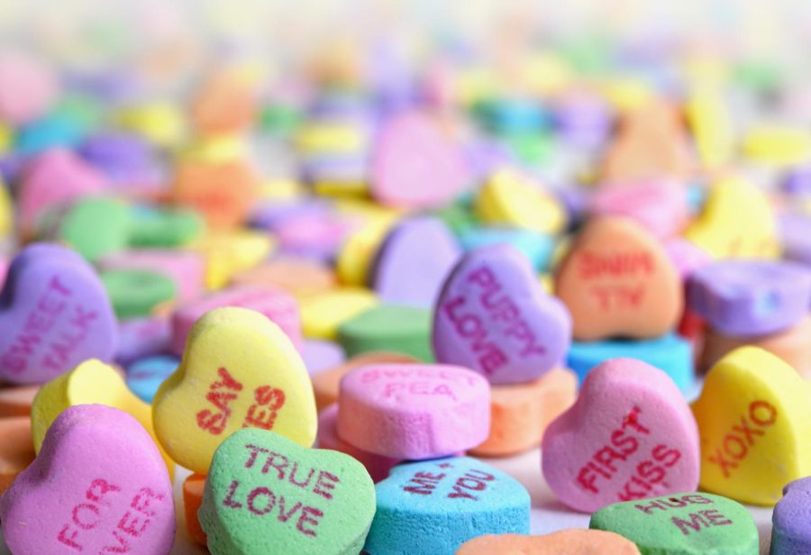 An+up-close+shot+of+candy+hearts+for+Valentines+Day.
