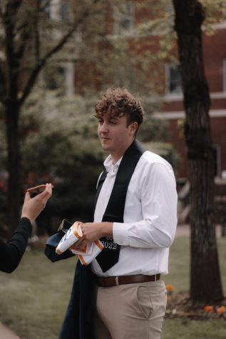 Carson Dover stands outside Weatherford Hall as they speak with a BD reporter.