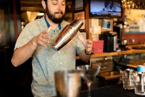 Bartender Josh Wyant prepares a cocktail at McMenamins on Monroe in Corvallis, Ore. on Thursday, June 30, 2022.