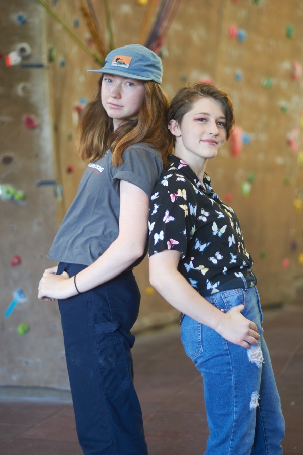 Co-organizers, Kate Hassett (left) and Shelby Wells (right), posing at McAlexander Fieldhouse where the event is going to be held this Sunday. Kate and Shelby are two of three employees who recognized the need for an inclusive climbing space for women, nonbinary, and trans students in a cis male-dominated sport. 
Not pictured: co-organizer Christine Castles