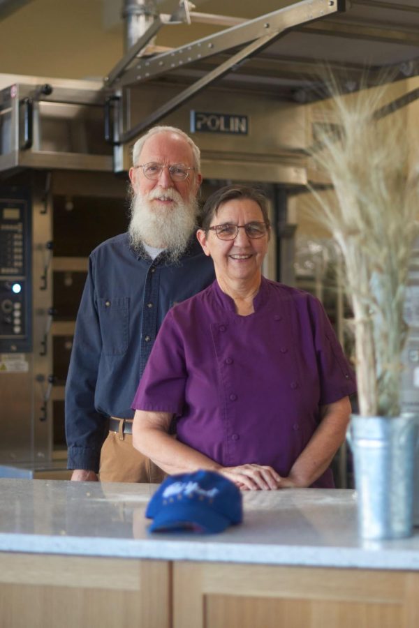Bakery owners, April and Craig Hall Cutting, posing together in Wild Yeast Bakery on Second Street, on Nov. 28. The two recently opened the bakery together in downtown Corvallis and focus on locally sourced, artisanal products. 