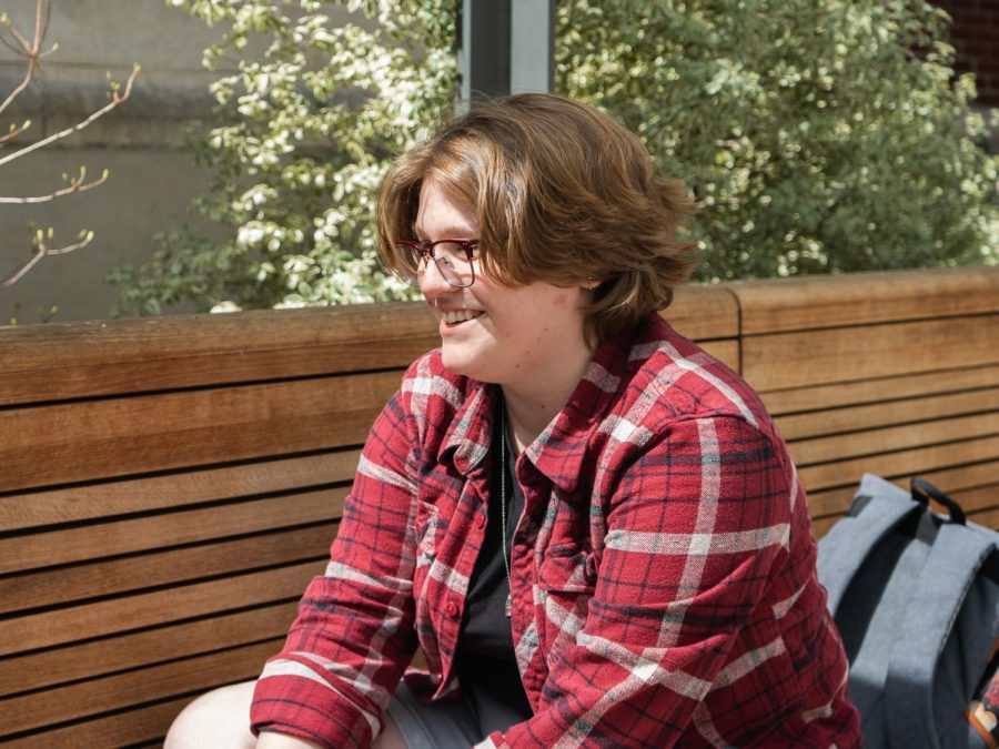 Third-year Abby Leader (she/her) talks about her experience at Queer Hair Salons on the Student Experience Center Plaza on April 14.  Straight people live in a different world than I do, and its just easier to talk to someone with a rainbow mullet,” Leader said.