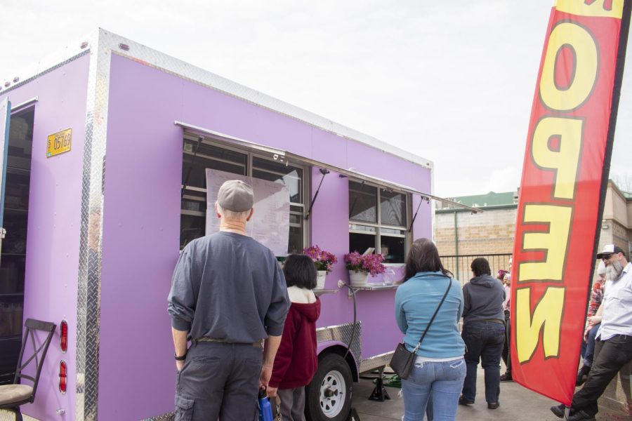 Eager customers ordering food on the opening day of Violette Food Truck, photographed on Apr. 22 in Lebanon, Ore. This crepe-and-coffee food truck offers a large variety of original recipes, staffed by two co-owners that split the business and culinary responsibilities.