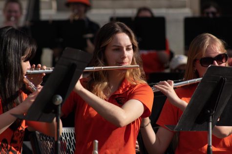 OSU Wind Ensemble flute players play in the band’s broadway medley-themed performance in the MU Quad in Corvallis on May 30. This specific performance was conducted by students in the ensemble rather than Erik Leung, the wind ensemble coordinator.
