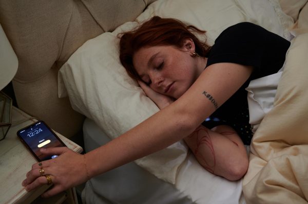 Avery Sinks (she/her) poses sleeping through her alarm on July 29. During the summer,
students don’t have their normal day-to-day routine. This can cause them to sleep in,
which messes up the body’s internal clock, therefore causing a lack of quality sleep.