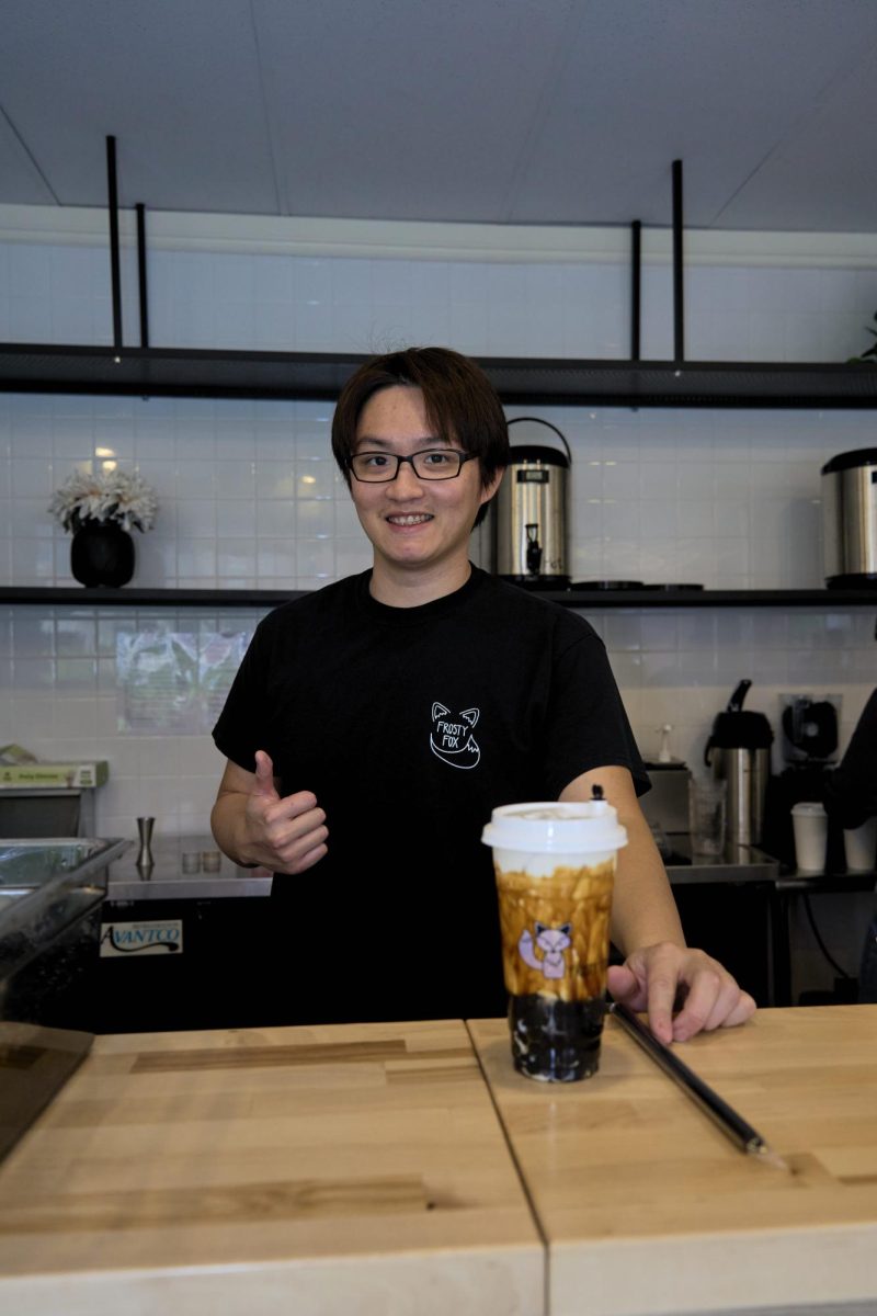 Manager, Cheng Han Yeh after making a brown sugar boba tea at the Frosty Fox on Oct. 20, in Corvallis. The Frosty Fox has a multitude of milk alternatives for their boba teas.