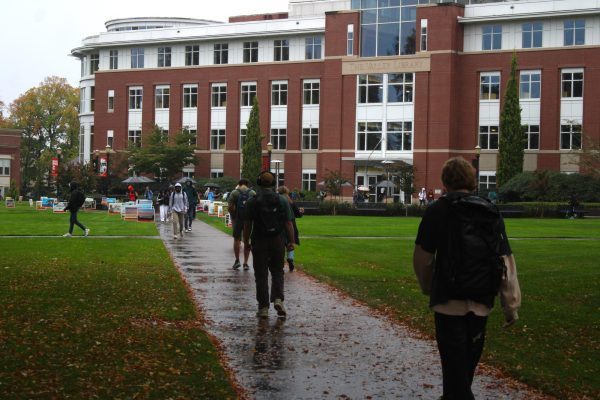 Outside the Valley Library, students walk through the rain on Oct 9.
