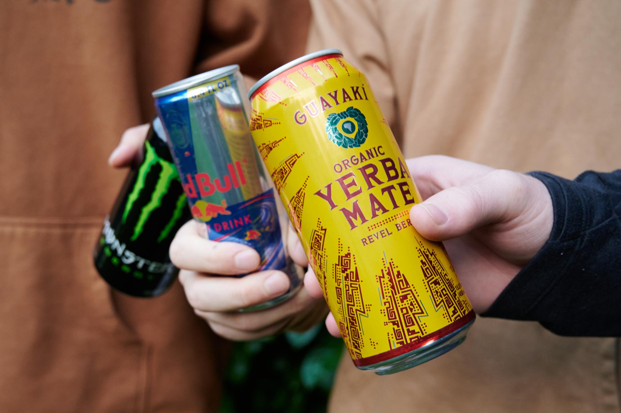 Monster Energy, Red Bull Energy Drink, and Guayaki
Yerba Mate cans being held in Corvallis Oregon on October 15.