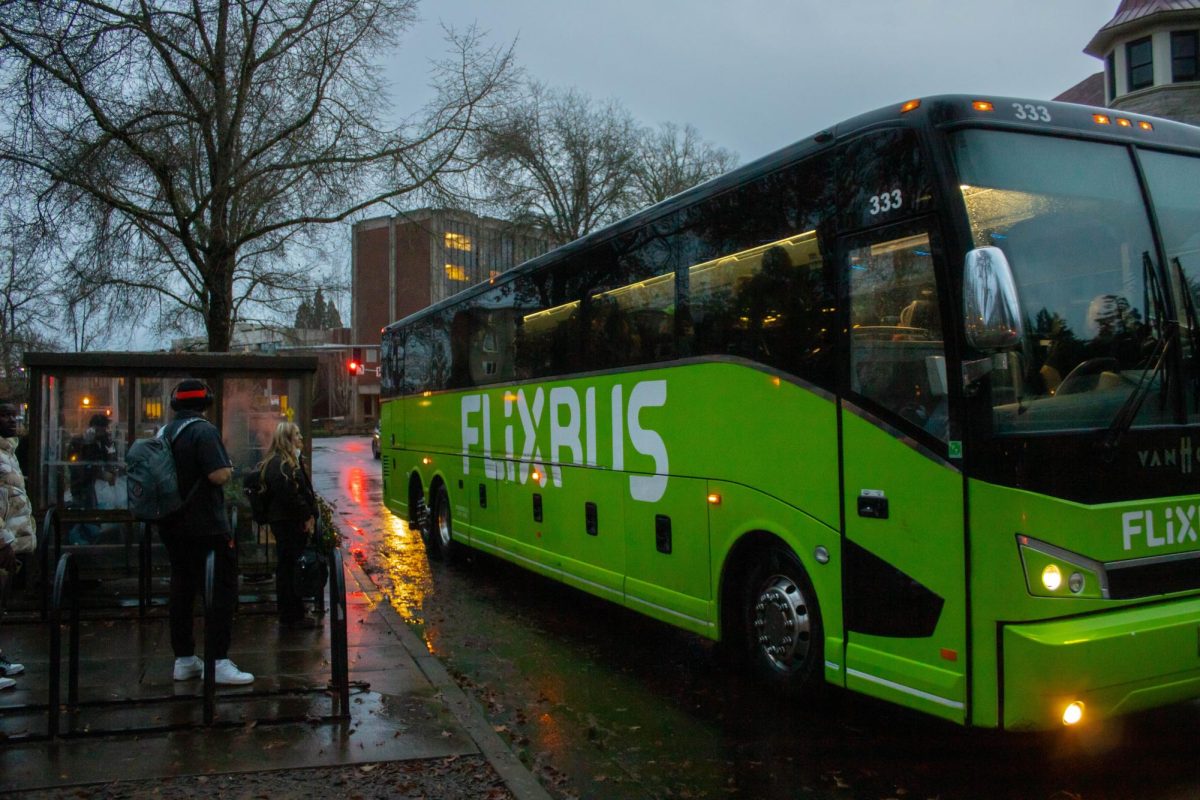 Students waiting at the bus stop to take the Flixbus on Dec. 1.
