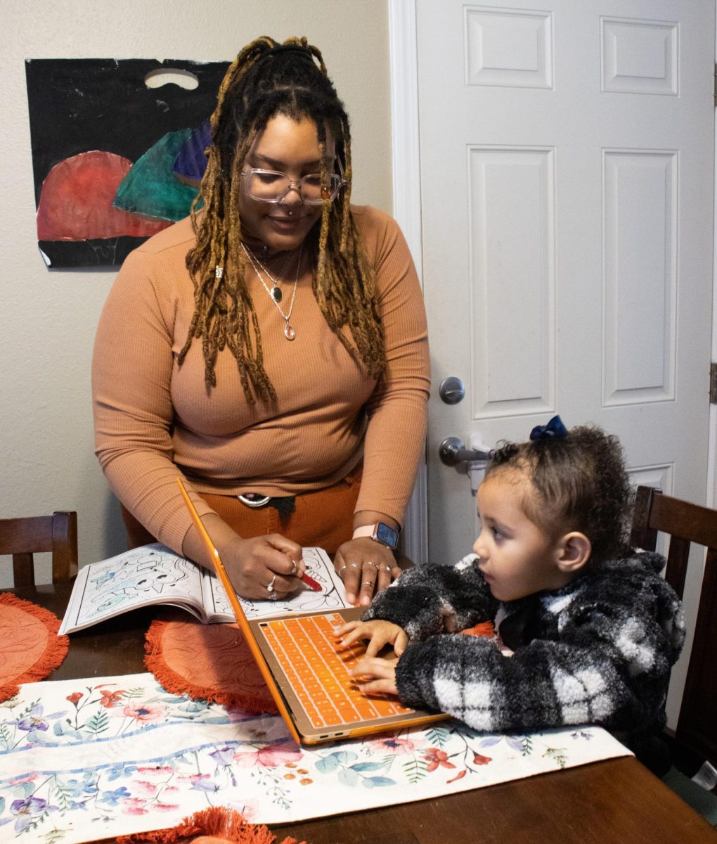 Mylizah Johnson, an Oregon State University student and a mother, is occupied with both focusing on her studies and spending quality time with her daughter on Dec. 8., 2023.