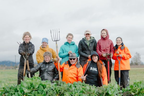 Members of the Organic Grower’s Club smile at the Sunday Skool work party at the student farm in Corvallis.
