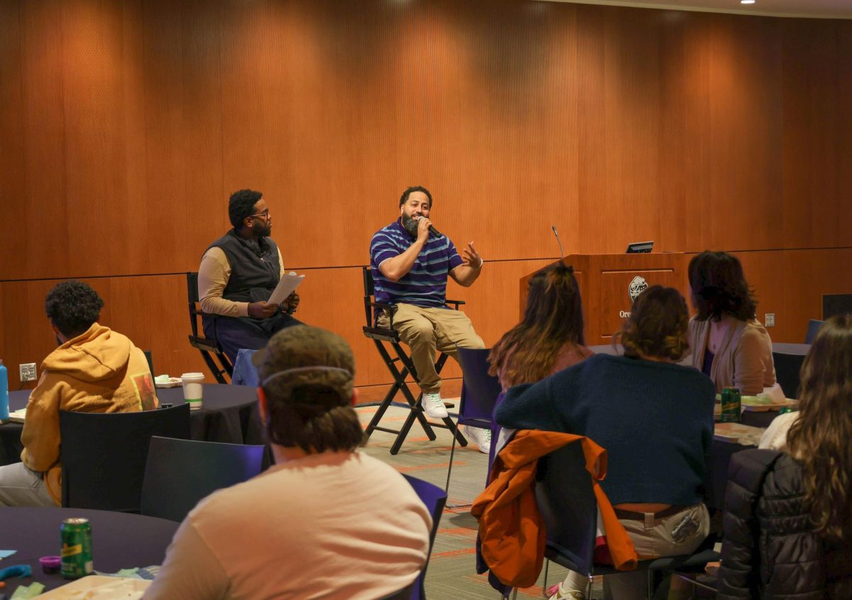 Randal Wyatt answers some interview questions from Faisal Osman during a discussion panel in the Memorial Union Horizon Room during the Black Albina: Constructing Environmental Justice event.