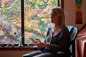 Psychic Susan Stark explains her profession Beaver's Digest contributor, Isabella Simer, on Oct 10, 2024, in her
office.