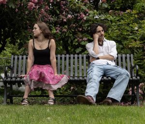 IThis photo illustration depicts Tuva Blom (left), a creative writing major, and Carter Pardu,e, a senior zoology major, as they sit in missed communication on Oregon State University campus in Corvallis, OR, on May 21, 2025.