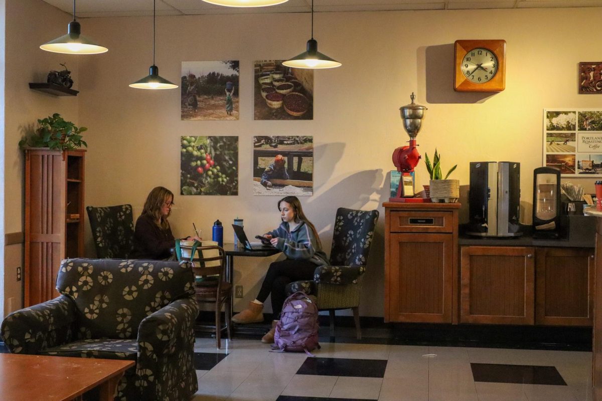 Libby Mills (left) and Alina Bench (right) scrapbooking together on January 16, 2026 at Java Stop. Libby and Alina stayed proactive and got a headstart following Week 1 at a nearby cafe this Winter.