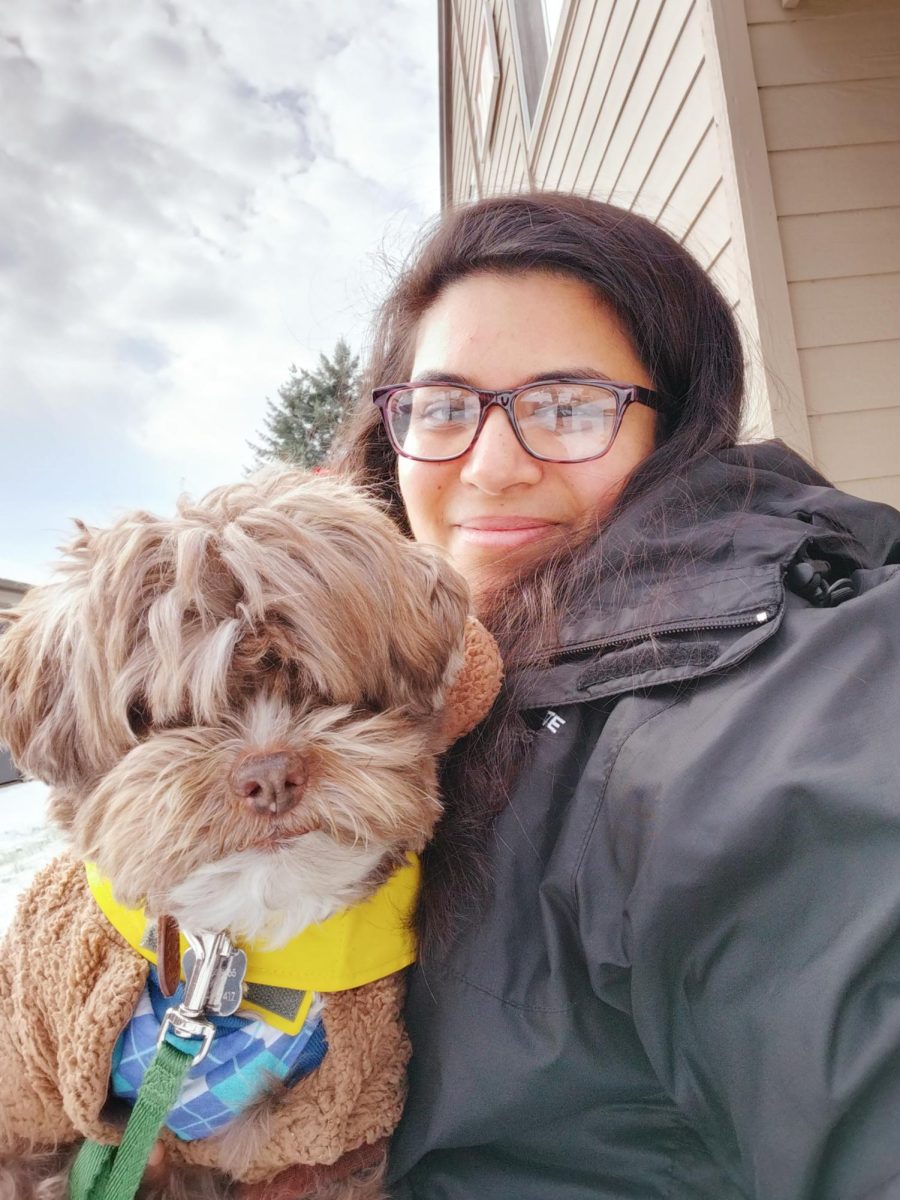 Woman holding a dog